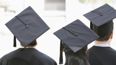 Graduates turn their backs